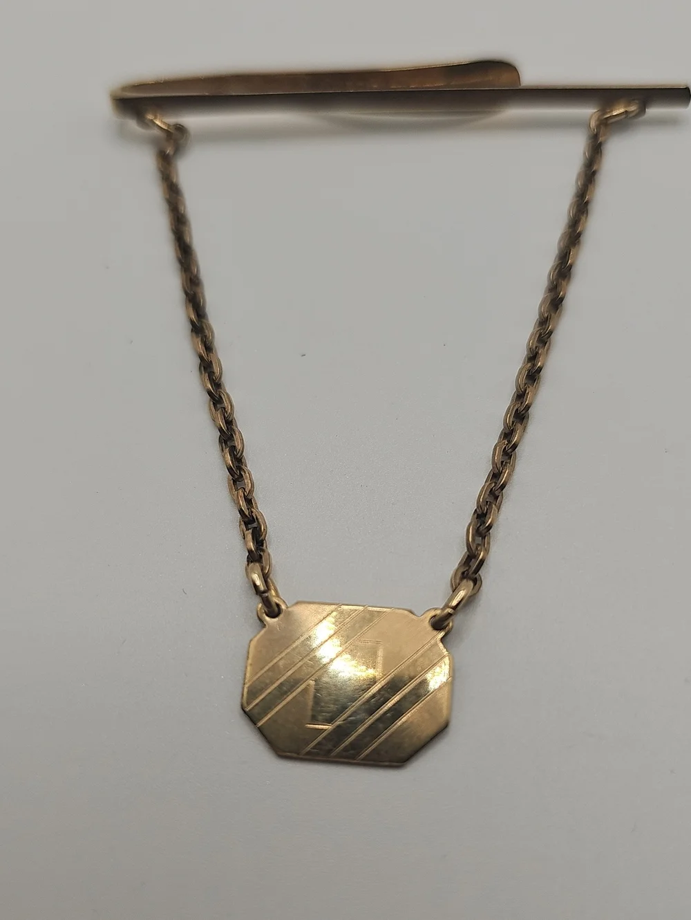 Tie Bar With Draped Chain By KIERSLER. USA Vintage 1940-19508